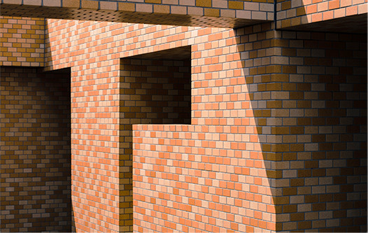 オレンジのタイルが張られた外壁の写真